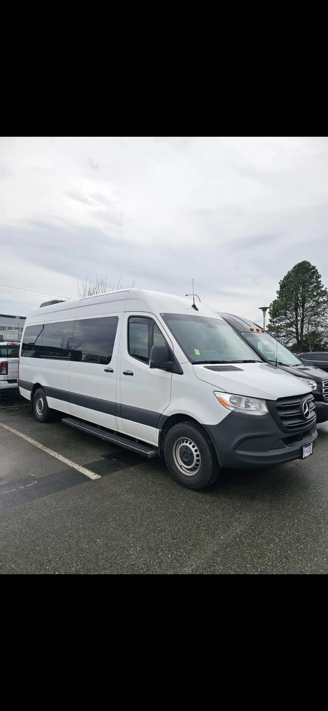White luxury van with driver to Whistler